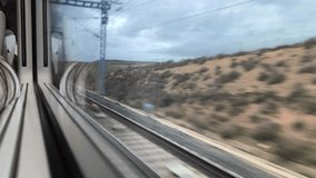 High speed train journey through spanish countryside - Powered by Shutterstock - Get 15% off with code: PIKWIZARD15