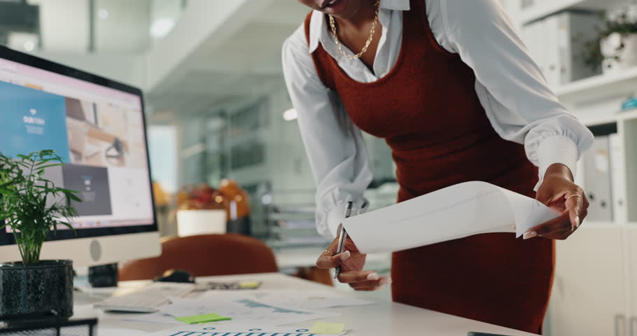 Black woman, paper and computer screen in office for finance, budget report and meeting preparation. Accountant, tech and documents in agency for business update, company development and information