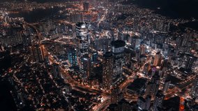 Aerial hyperlapse of skyscrapers and traffic in downtown Busan, Seomyeon district in South Korea at night - Powered by Shutterstock - Get 15% off with code: PIKWIZARD15