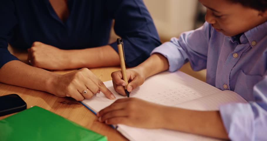 Homework, hands and tutor with child and notebook for learning, education and development. Studying, writing and knowledge with closeup of kid in family home for help, test solution and math project