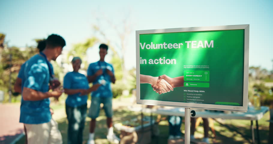 Sign, volunteers and unity for charity, people and discussion for nonprofit, kindness or helping. Outdoor, group and board for foundation, services and planning for project, collaboration or teamwork