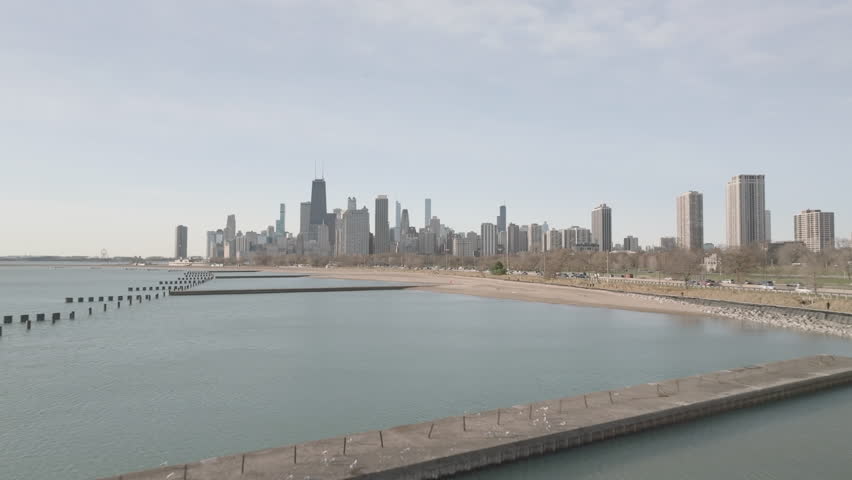 Aerial view of Chicago and Lake Michigan at sunrise.