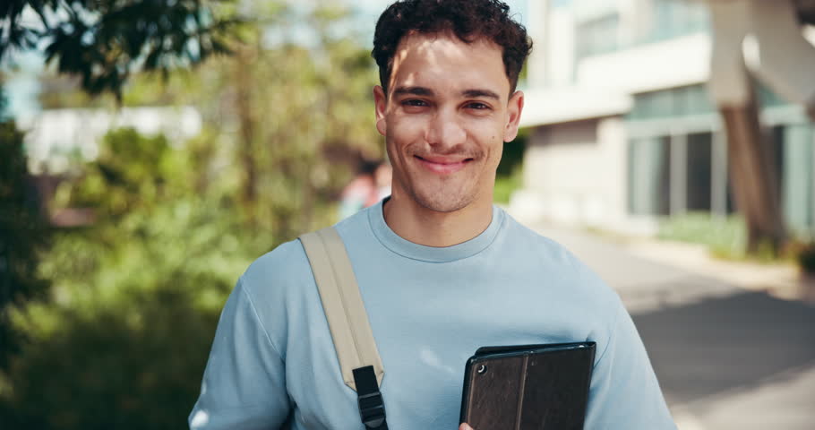 Face, student and happy man with tablet for education, academic confidence and smile in college. Campus, male person and outdoor in university for digital learning, scholarship and pride in portrait