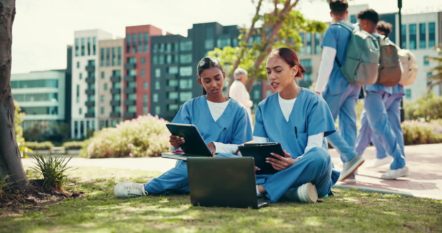 Team, doctors and internship with people and laptop in outdoor for learning, healthcare resident and scholarship. Medical students, university and nurse with friends at teaching hospital for study