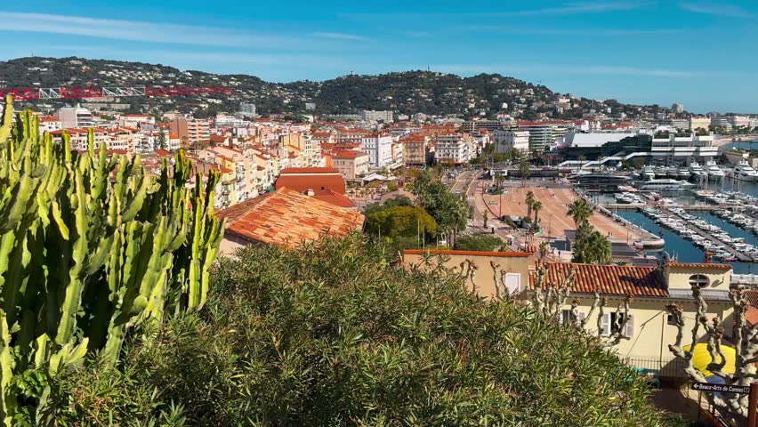 Panoramic view of the marina with luxury yachts, the Palais des Festivals et des Congres and the Croisette, Cannes, Provence-Alpes-Cote d'Azur, France 27 February 2025. High quality 4k footage