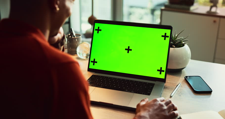 Man, business and laptop green screen in office for streaming service, connectivity and online webinar. Person, talking and tech with tracking markers for media mockup, video call and conversation