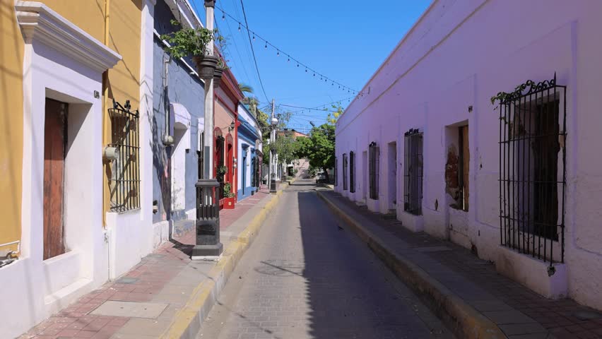 Mexico, Mazatlan, Colorful old city streets in historic city center near El Malecon promenade, ocean shore Zona Hotelera Hotel Zone and central Mazatlan Basilica cathedral .