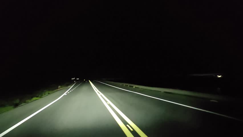Driving in rural at night. Point of view by windshield and real time.