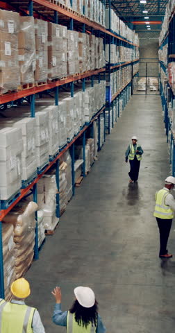 Staff, inspection and quality control in warehouse for logistics, manufacturing or stock management for delivery. Factory, workers and safety for freight, supply chain or shipping company in industry