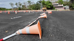 Red traffic cone on asphalt - Powered by Shutterstock - Get 15% off with code: PIKWIZARD15