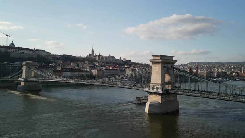 Chain Bridge Daytime View

A scenic daytime view of Budapest’s Chain Bridge spanning the Danube River, with Fisherman’s Bastion in the background.
