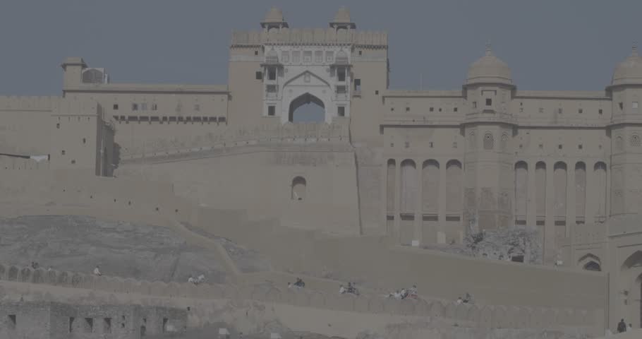 Jaipur, Rajasthan, India. Ungraded C LOG 2, Amber Fort. Slow Motion Pigeon Fly Above Amer Fort Or Amber Fort, Amer. Amer Palace Is Great Example Of Rajput Architecture. Popular Tourist Attraction In