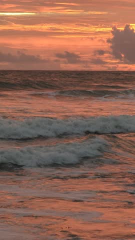 Sunset Glow Over the Endless Sea in Vertical Shot in Kanyakumari, India