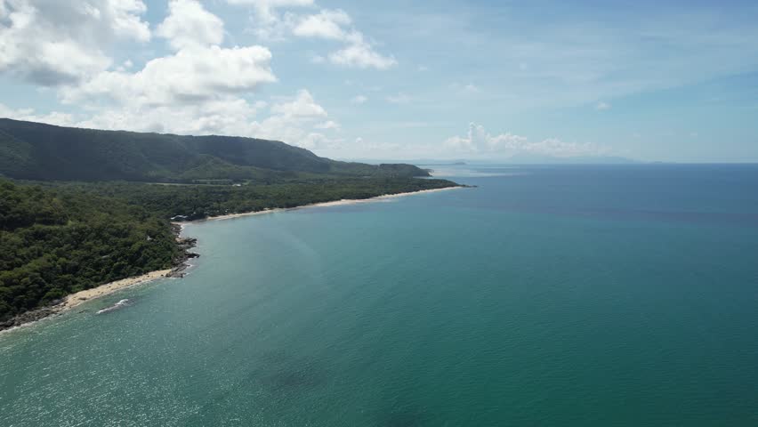 Spectacular smooth cinematic aerial footage of Pretty Beach north of Cairns Queensland Australia