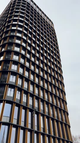 High-rise Apartment buildings in modern cityscape. Contemporary architecture facade with geometric patterns offering inspiration for modern design and urban development project