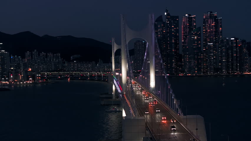 Aerial view of traffic on Gwangan suspension bridge in Busan, South Korea at night