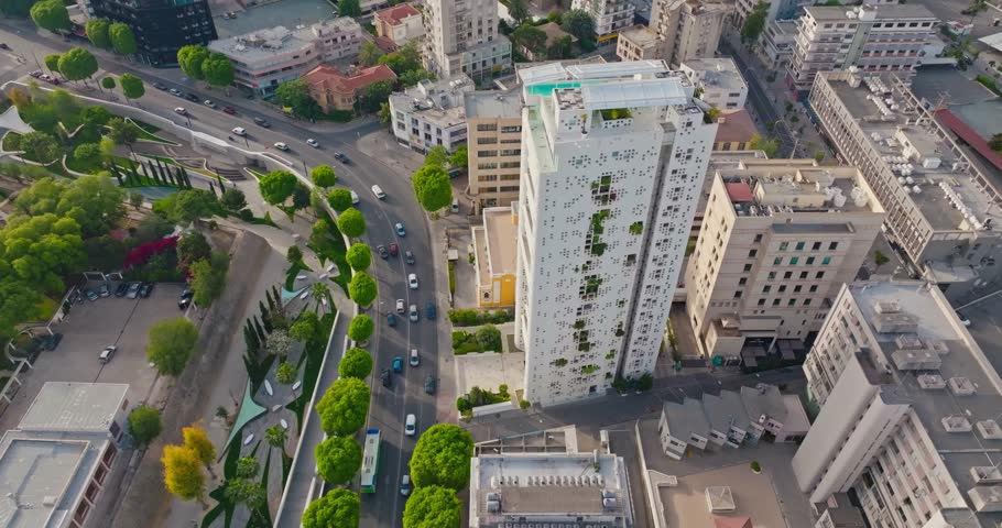 City Traffic in Nicosia, Cyprus Drone Footage of Cars and Buses Moving on Roads and Intersections in the Financial Hub. High quality 4k footage