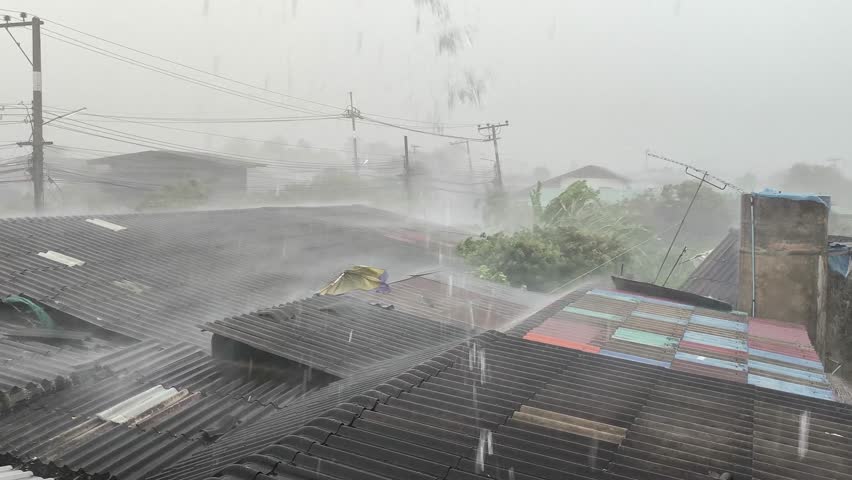 Rainstorm is blowing in countryside village, Chiangmai province Thailand.