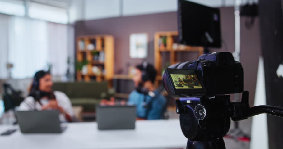 Camera, video recording or screen with people in talk show for online streaming or audio broadcast at home studio. Influencers, commentary or technology with live entertainment, news or radio channel