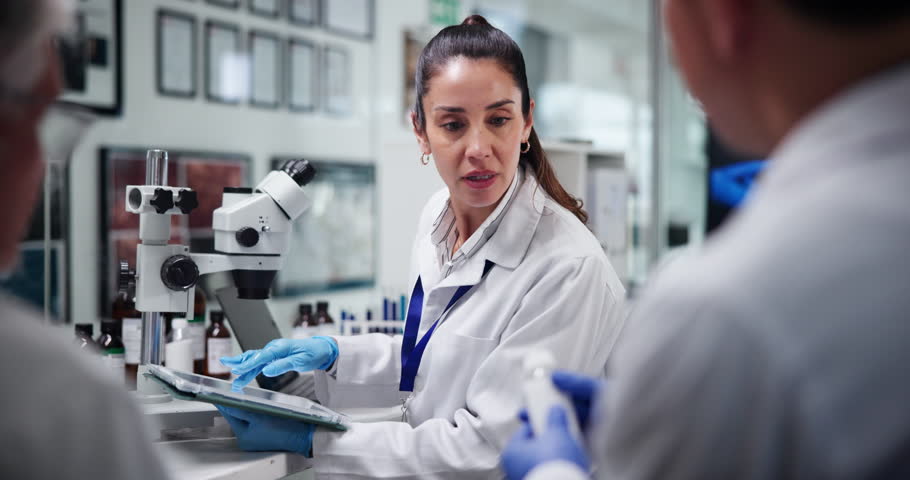 Discussion, scientist and group with medicine, lab and quality control for drug research and innovation. Healthcare, colleagues and clinical trail of treatment in clinic, people and experiment