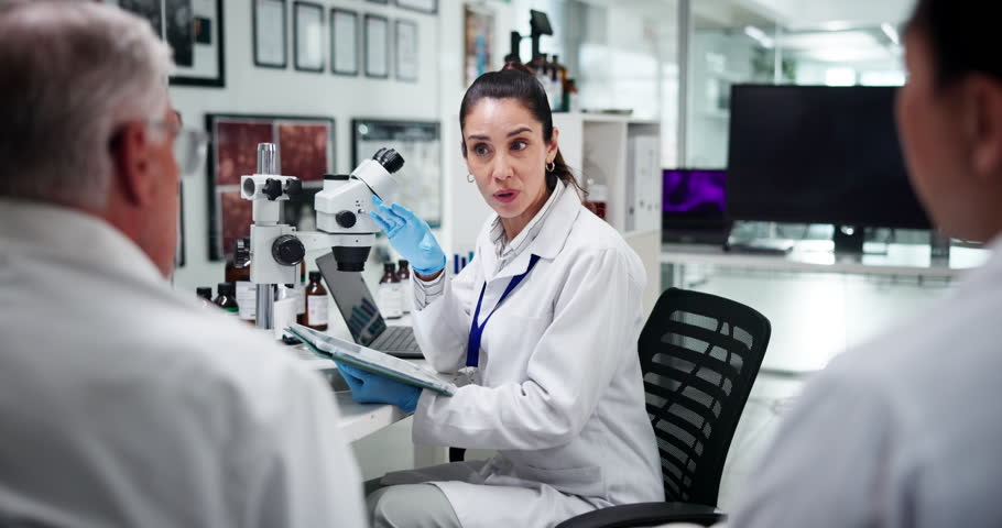 Ideas, scientist and group with tablet, lab and discussion for medical research, smile and treatment. Pharmaceutical, teamwork and people with tech for healthcare, info and happy for breakthrough