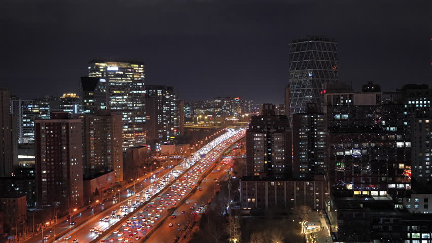 The scene of towering skyscrapers and congested traffic flows in Beijing, China