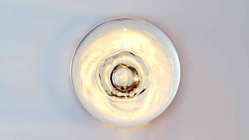 Golden essence balls gather into flowers, water-like essence hydrates, activates cells to penetrate the skin, cosmetic essence molecules are used in creams, facial serums, hair care,essential oils.3d.
