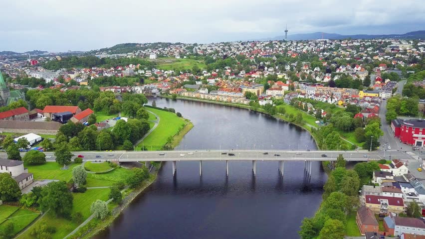 Nidelva river and Trondheim city aerial panoramic view. Trondheim is the third most populous municipality in Norway.