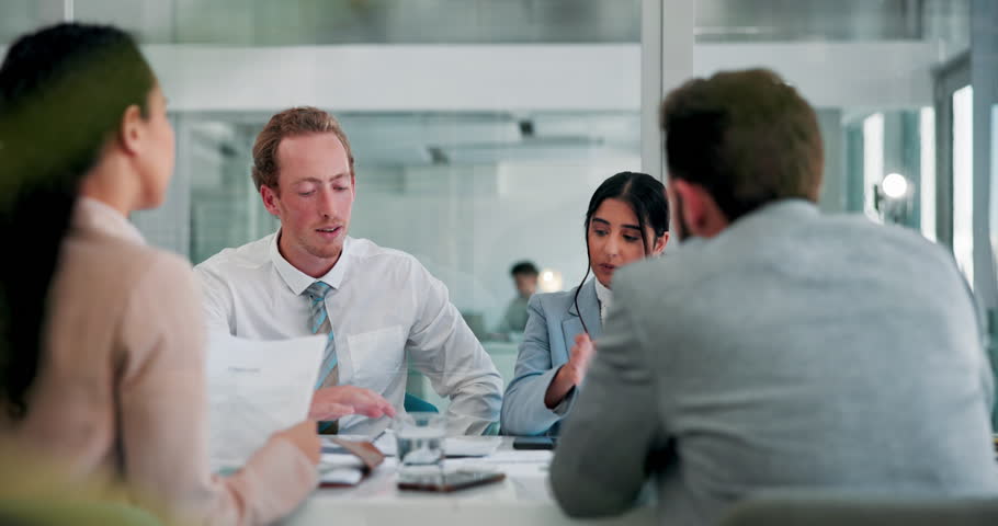 Business people, group and discussion with paperwork in office, brainstorming ideas and accounting proposal. Meeting, collaboration or planning strategy with document for financial audit or budget