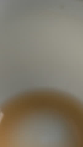 Pouring Coffee Cream into a Cup creates an inviting moment full of delightful aromas and flavors. Media