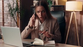 Busy professional Caucasian girl secretary office worker employer manager business woman female businesswoman working laptop searching information consult client mobile phone call plan meeting indoors - Powered by Shutterstock - Get 15% off with code: PIKWIZARD15