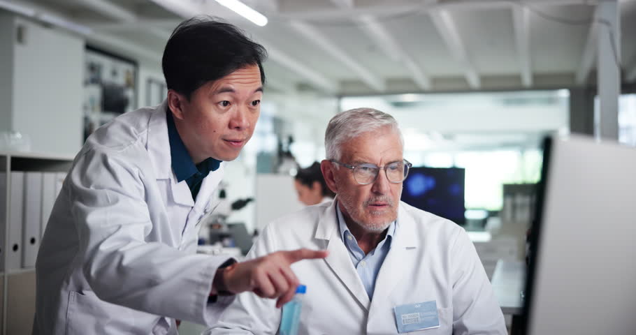 Computer, research and science with people in laboratory together for collaboration or discussion. Healthcare, innovation and medical analysis with men at work on science breakthrough for discovery