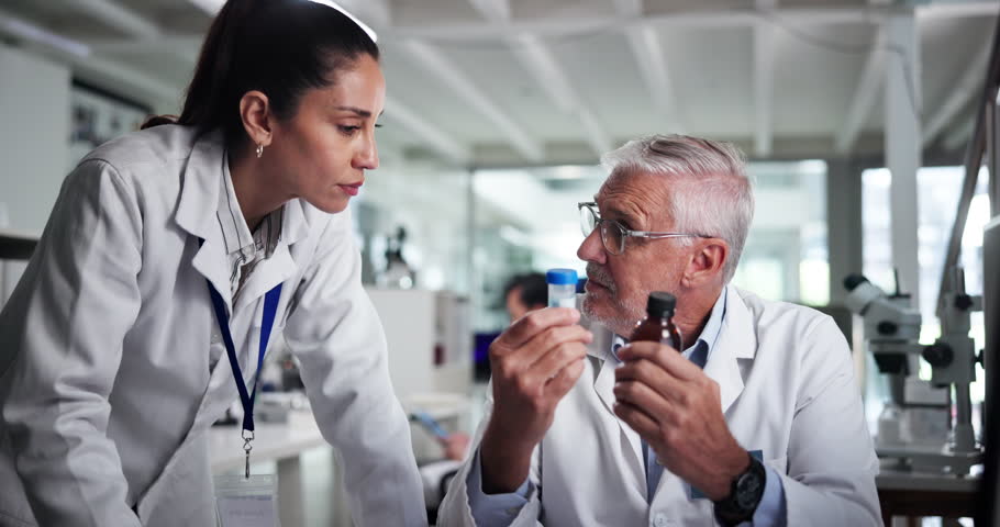 Computer, medical and science with people in laboratory together for collaboration or discussion. Conversation, healthcare and research with scientist team at work for breakthrough or innovation