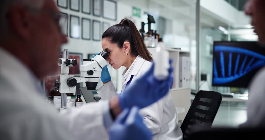 Medicine, woman with microscope, healthcare and quality control for drug research, medical team or innovation. Experiment, pharmaceutical and people with analysis of antibiotics, scientists or clinic