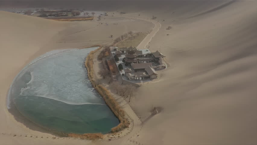 sunny evening time desert dunes old town pond aerial panorama 4k gansu china