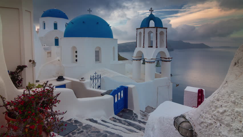 sunset sky santorini island oia town famous rooftop coastline panorama timelapse 4k greece