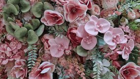 ballroom decoration with pink flowers on the wall. reception with tropical luxury pattern made of plastic petals will last a long time. floristry supplies - Powered by Shutterstock - Get 15% off with code: PIKWIZARD15