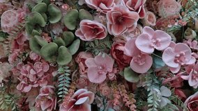ballroom decoration with pink flowers on the wall. reception with tropical luxury pattern made of plastic petals will last a long time. floristry supplies - Powered by Shutterstock - Get 15% off with code: PIKWIZARD15