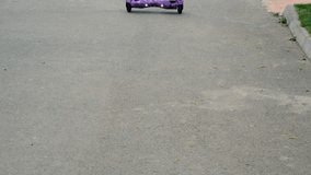 child riding a hoverboard. Selective focus. - Powered by Shutterstock - Get 15% off with code: PIKWIZARD15
