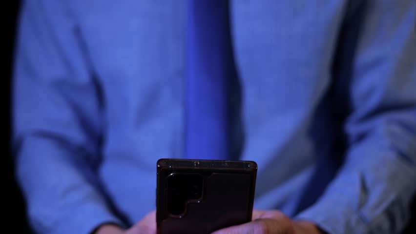 Animation of phishing email message received in inbox smartphone hacked business man working in office