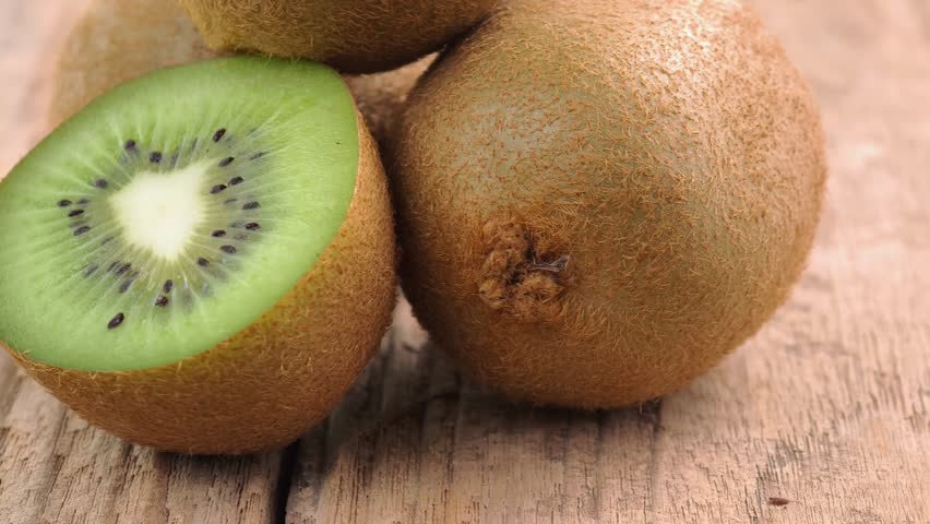 Macro Shot of Rotating Kiwi Fruit Slices	