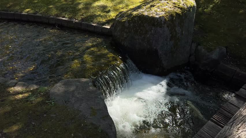 Small waterfall in Japanese garden 