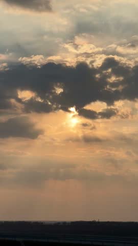 beautiful orange sunset with clouds over the road