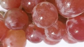 A bunch of red and green grapes, isolated on a white background - Powered by Shutterstock - Get 15% off with code: PIKWIZARD15