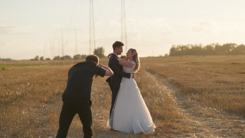 Wide shot of wedding couple having their pictures taken
