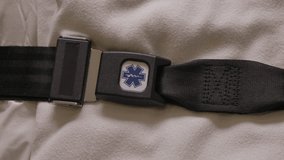 Medical strap on a bed in the back of an ambulance - Powered by Shutterstock - Get 15% off with code: PIKWIZARD15