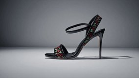 These fashionable black stiletto heels boast intricate floral designs that make them perfect for any special occasion - Powered by Shutterstock - Get 15% off with code: PIKWIZARD15