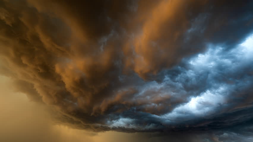 Stunning 4K timelapse captures dramatic black clouds rolling through nature, showcasing intense weather patterns, atmospheric movement, and the raw power of a storm in motion