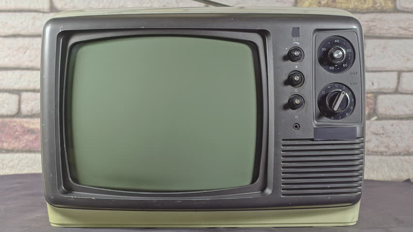 Man Hand Fine Tuning And Channel Search Vintage Television with Control Button Footage.