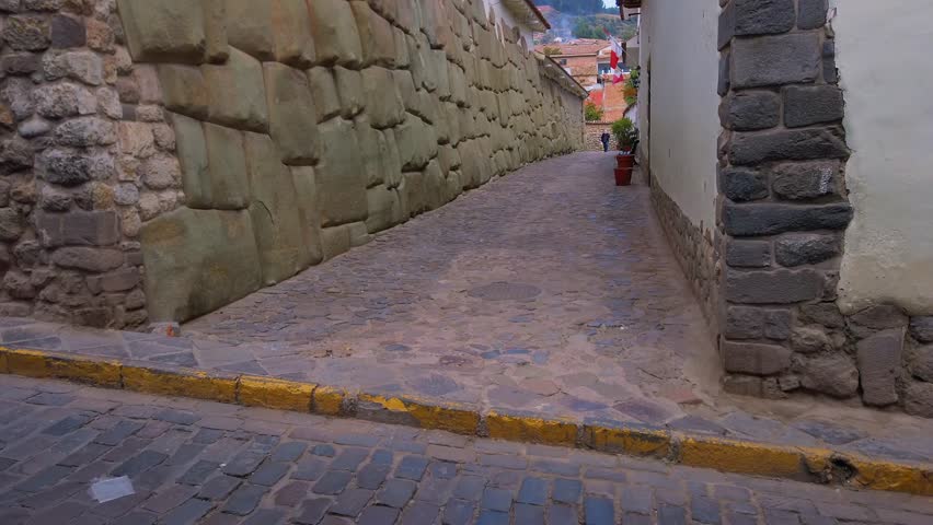 Cobblestone street of the colonial city center of Cusco, Peru